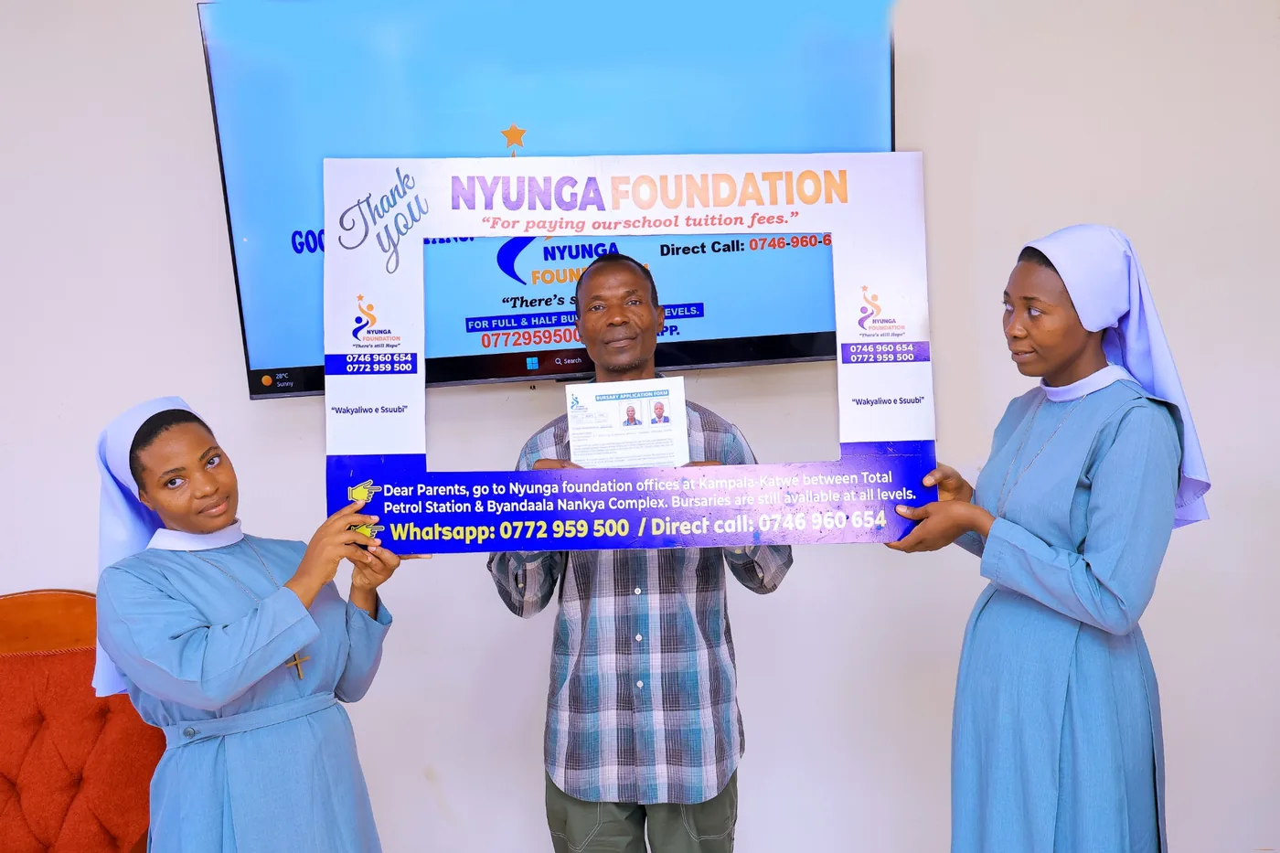 A father completes the bursary support process