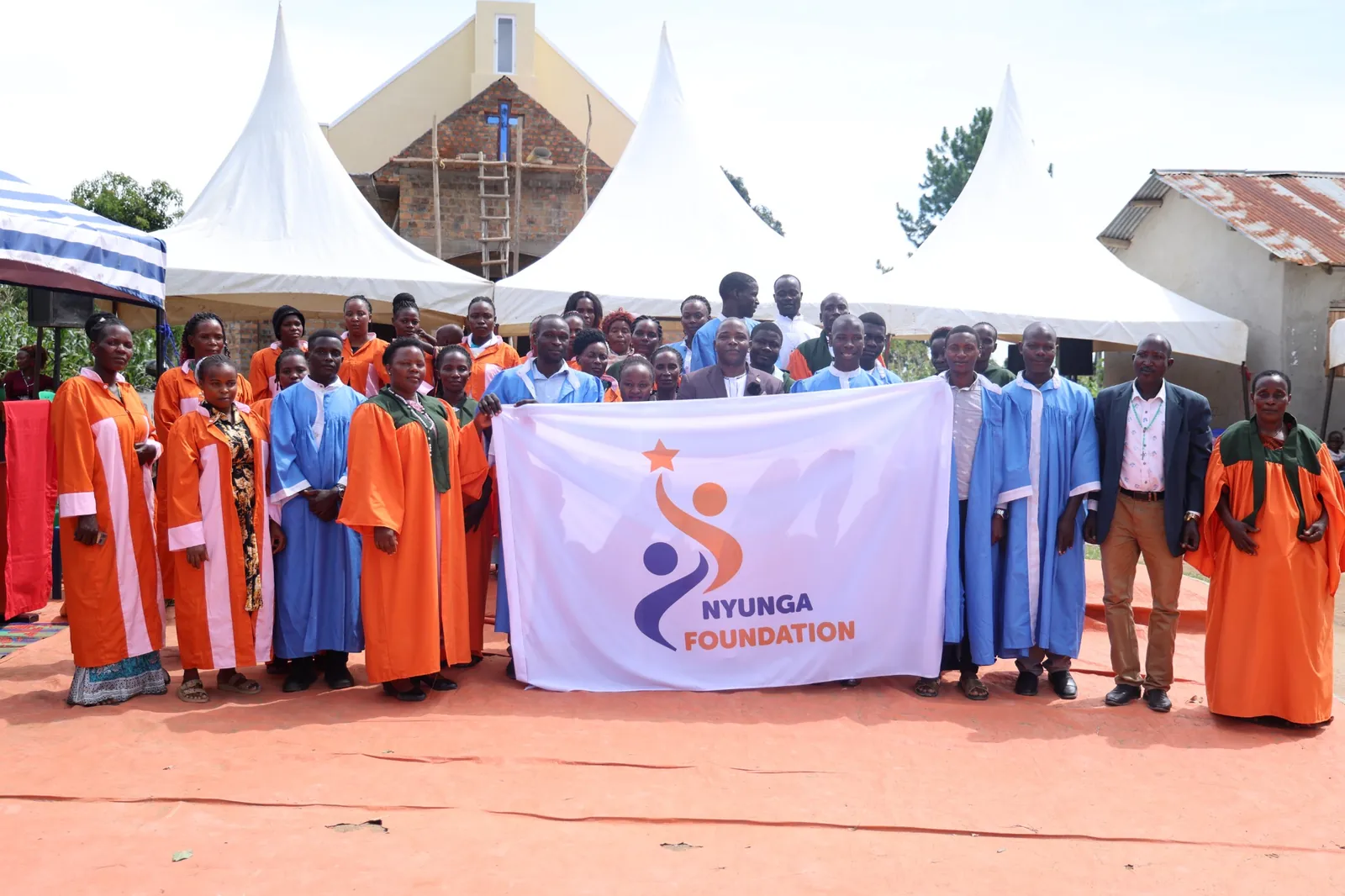 Community members celebrating Nyunga Foundation education support
