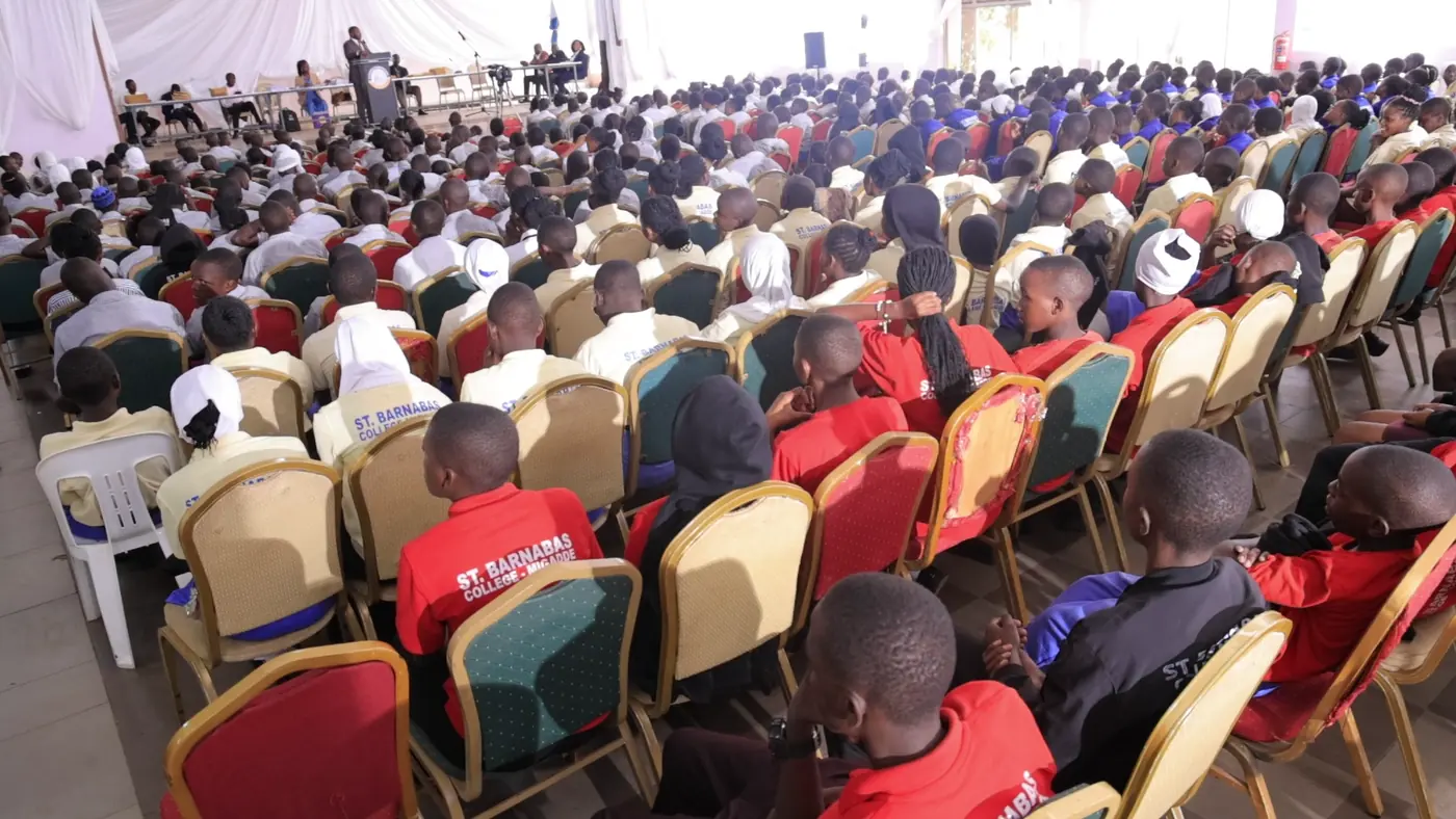 Students listening during a school event